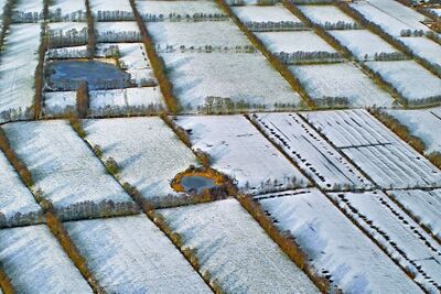 Luchtfoto met sneeuw van Dobben, Opende